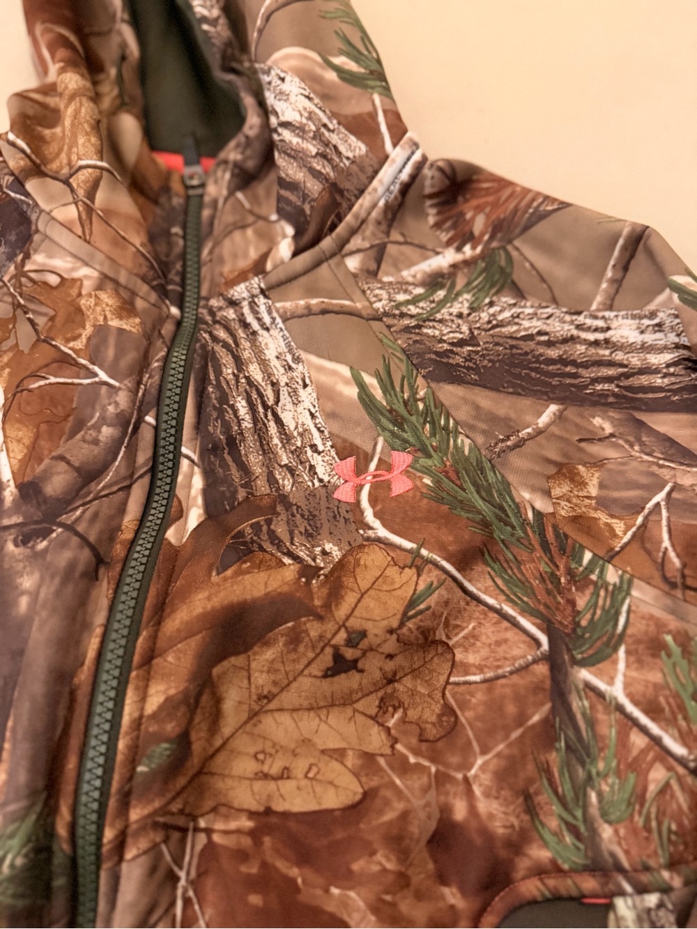 Women’s Under Armour, XS camo zip up jacket. Never worn.